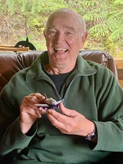 John Fite with a model of one of the planes he flew